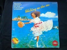 Walking on the sea  musique originale du film publicitaire Schneider/ 45t SABAN