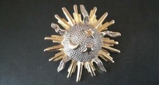 Broche soleil ancienne astres