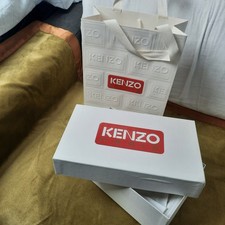 Boite KENZO  un peu abîmée