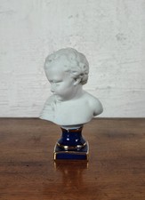 sublime sculpture de puto en faience blanche sur socle bleu et doré buste chérub