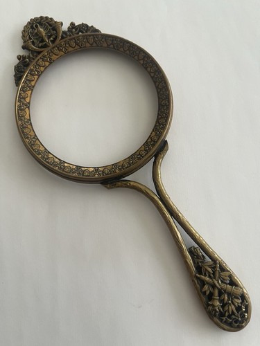Ancien miroir face main en - À,