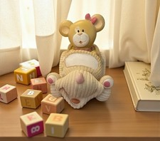 Tirelire oursonne en voiture