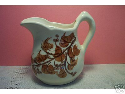Vintage old pottery creamer - old,