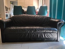 canapé convertible 2 places en cuir de vachette très peu servi. Vintage