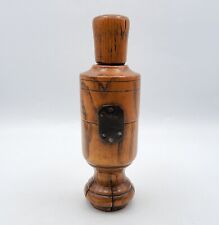 Bouchonneuse en bois tourné