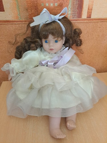 Poupée porcelaine tête - en,