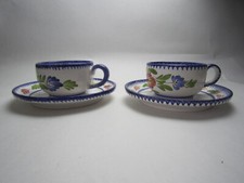 PAIRE DE TASSES ET SOUS TASSES