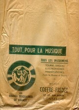 Sac Papier avec Pub La Maison COFFRE FREDET Musique 57 59 rue Dorée à MONTARGIS
