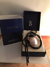 pendentif "" initial "" boucheron. edt 5ml..