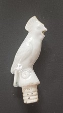 Bouchon verseur ancien en porcelaine. Oiseau . Eclat sur la crête.