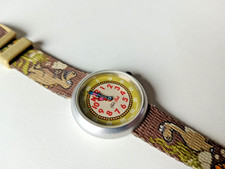 Montre Flik Flak Dinosaures 2008 bon état pile neuve