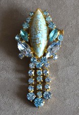 Broche vintage strasse bleu