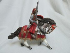 Chevalier de la marque Schleich - Cavalier rouge avec sabre année 2007