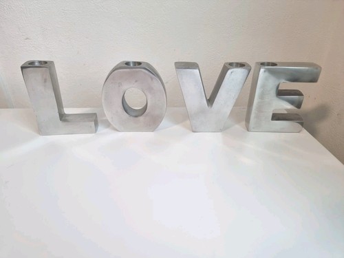 Bougeoirs lettres formant - ,
