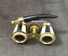 Anciennes jumelles de verres d'opéra vintage blanche nacre et manche laiton