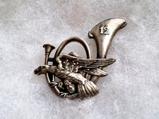Un insigne militaire " 12°