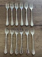 12 anciennes fourchettes à