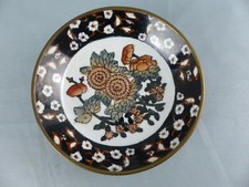 Coupelle décorative en porcelaine sur monture en métal