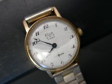 jolie montre homme vintage Elvia,mécanique trotteuse,17 rubis,D 32mm,P67g