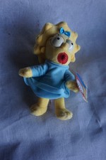 Peluche Baby Maggie avec tétine The Simpsons ht 20 cm