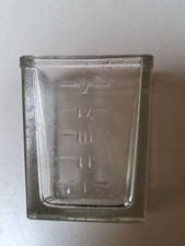 Ancien résevoir en verre de