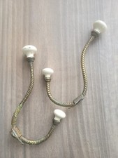 2 patères anciennes 2 têtes en porcelaine