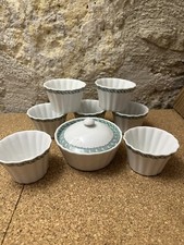 7 moules à muffin Et 1 Pot À