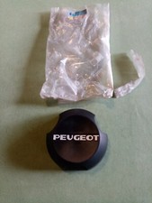 PEUGEOT DIVERS Un enjoliveur de roue Réf : 5215.72