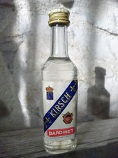 Mignonnette bouteille Kirsch Bardinet 5 cl pleine en très bon état