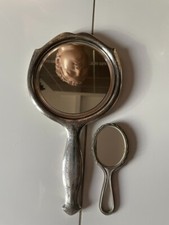 Miroir face main - face, en
