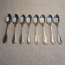 8 Cuillères à MOKA en Argent Massif  Poinçon MINERVE  décors coquille .