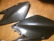 caches lateraux sous selle  250 125 rm   ufo  