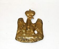 Ancienne plaque en laiton (casque?) à décor d'aigle couronné sur une branche