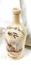 Bouteille en terre vernissée