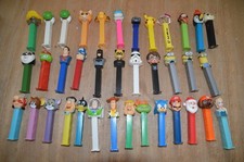 LOT DE 37 DISTRIBUTEURS PEZ :  MARVEL, STAR WARS, OBELIX, DESSINS  ANIMES.....