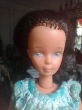 Poupée Bellita brune de