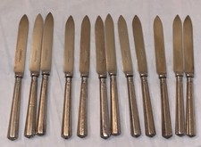 A set of twelve silver handled Ellington fruit knives. Sheffield 1912. 