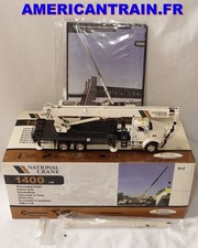 Camion grue à cabine