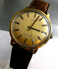 ANCIENNE TIMEX n°2616102477 MIXTE MECANIQUE,ETAT D'EPOQUE CONVENABLE,B FONCTIONS