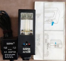 Flash SUNPAK- Auto 28 + AC.ADAPTATEUR CHARGEUR