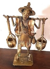 Porteur d'eau en bronze, cire