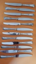 12 couteaux métal argenté Ercuis