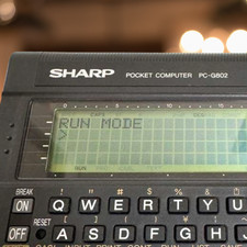 Ordinateur de poche Sharp PC-G802 vintage rétro assembleur Japon testé foncti...