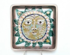 Vide poche visage soleil en