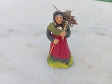 SANTON CARBONEL ANCIEN...TERRE CUITE..VIELLE FEMME PORTEUSE DE BOIS...HAUT 90 MM