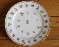 Assiette plate en porcelaine de Paris, XIXe Empire, Dagoty, fleurs