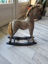 Ancien petit cheval à bascule en bois