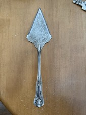 Pelle à tarte coupante en