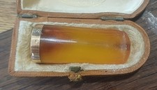 Fume-cigare, cigarette or, ambre.