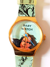 Magnifique et unique Montre pour Bébé à tête d'Ange - marque Baby Watch  -
